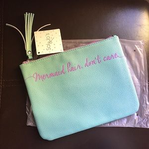 Free leather-like statement pouch